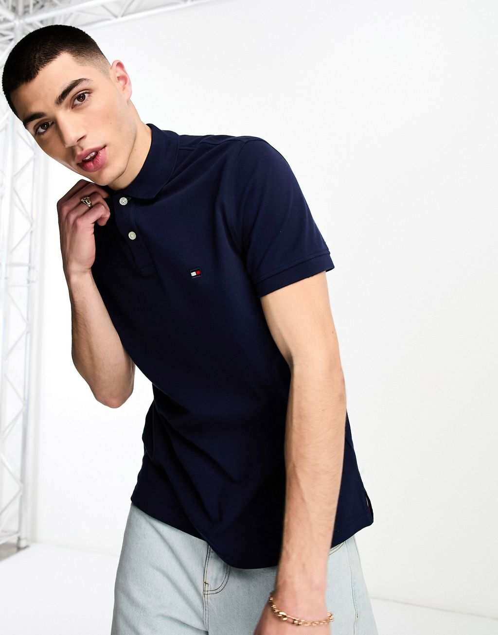 

Темно-синяя рубашка-поло с короткими рукавами и логотипом Tommy Hilfiger x Shawn Mendes
