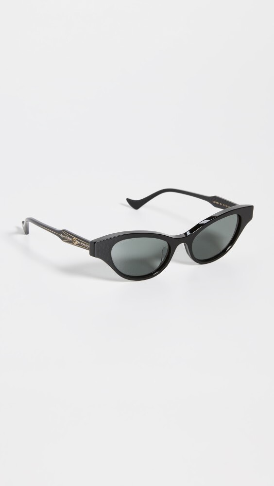 

Солнцезащитные очки Gucci Narrow Winged Cat Eye, черный