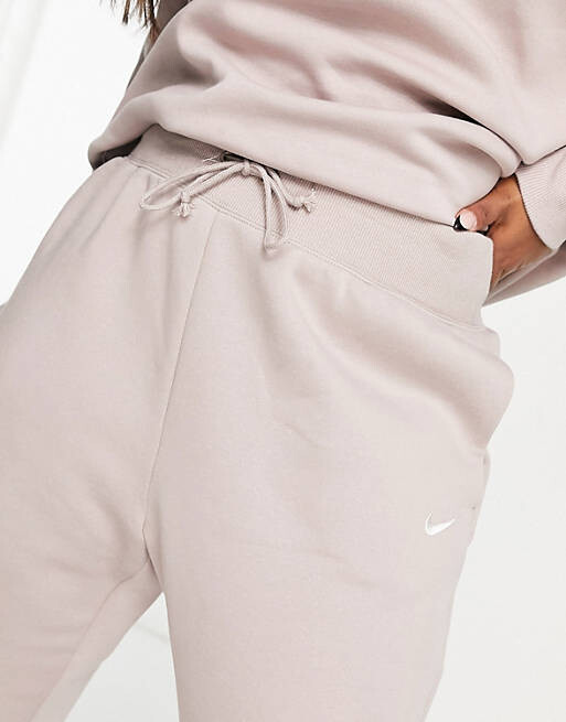 

Белые джоггеры Nike Plus Phoenix