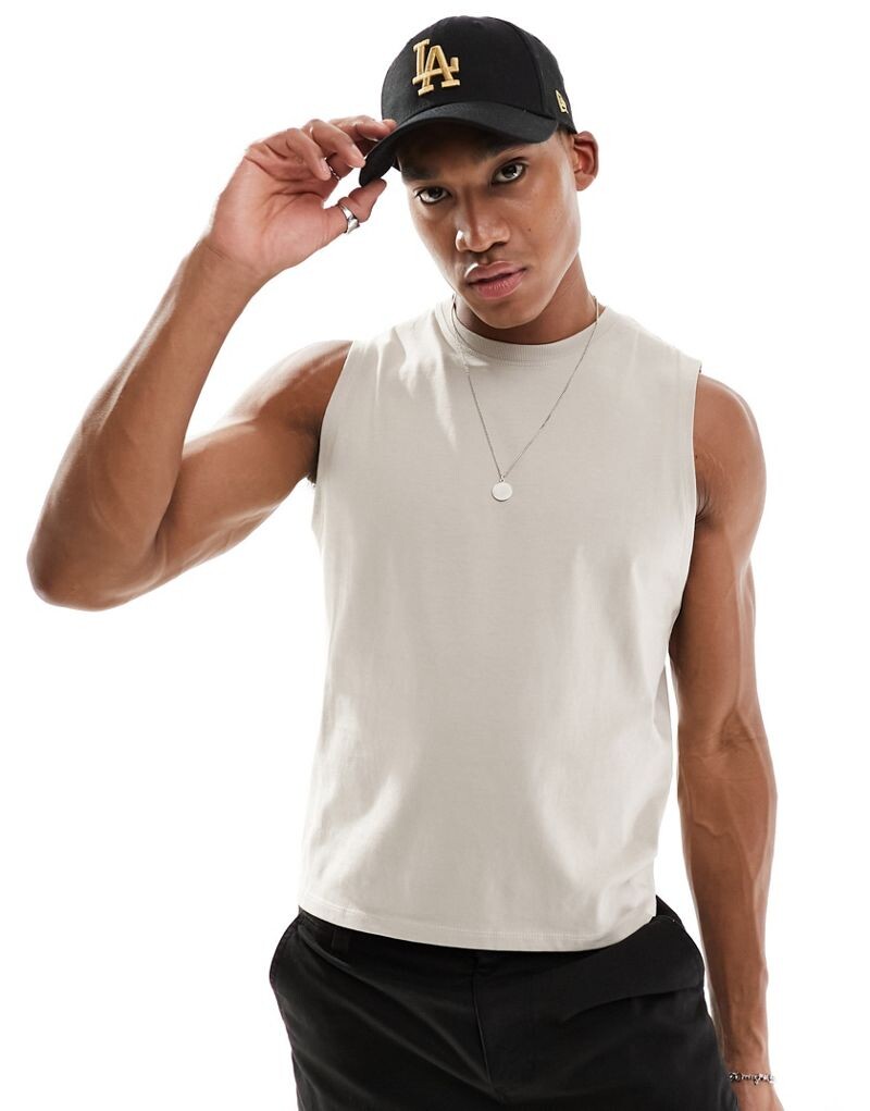 

Укороченный топ без рукавов ASOS DESIGN
