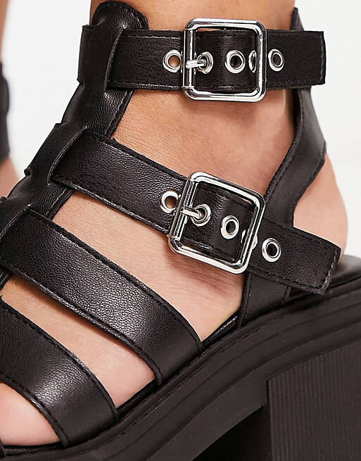 

Черные босоножки на массивном каблуке средней высоты ASOS DESIGN Wide Fit Highway