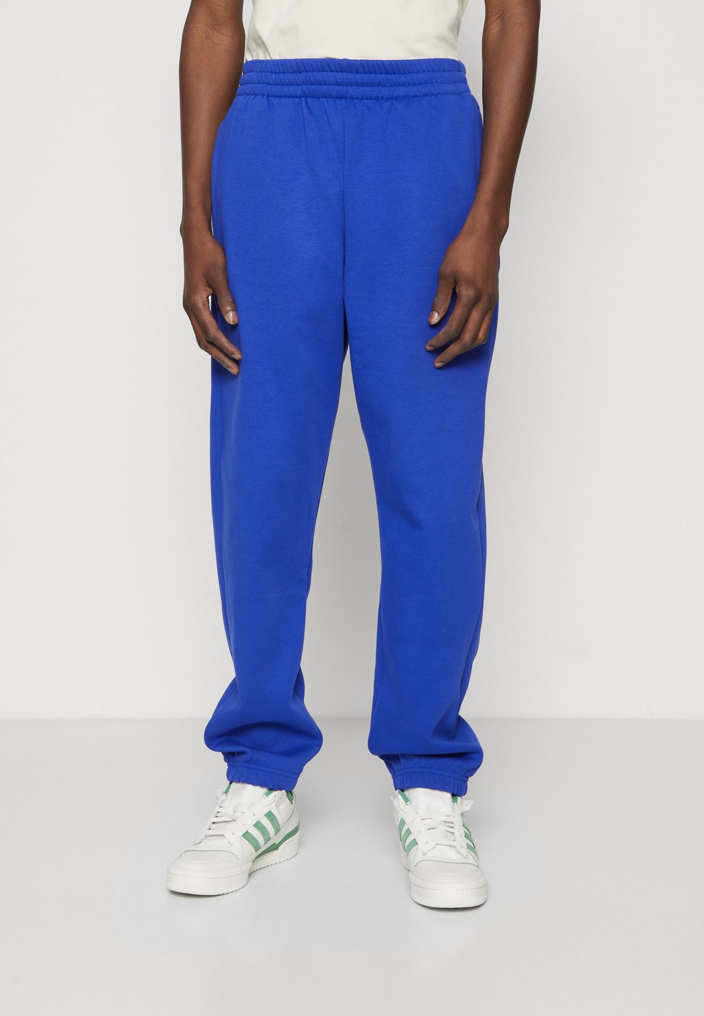 Спортивные штаны JOGGER UNISEX adidas Originals, цвет lucid blue