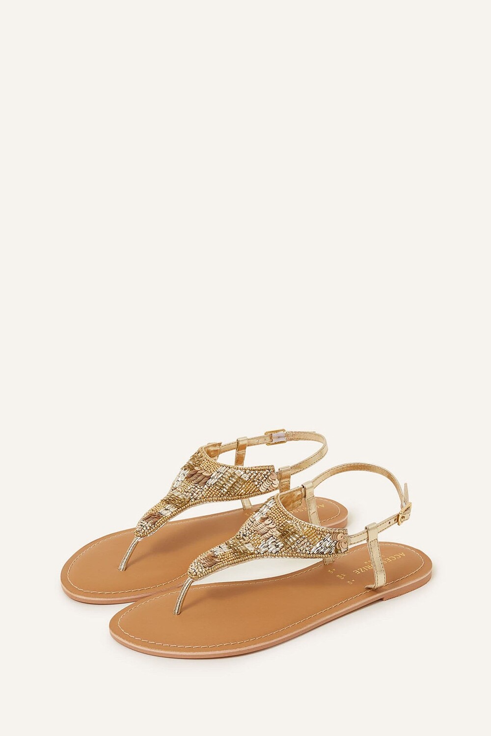 

Золотые шлепанцы украшенные бусинами и пайетками Accessorize, желтый