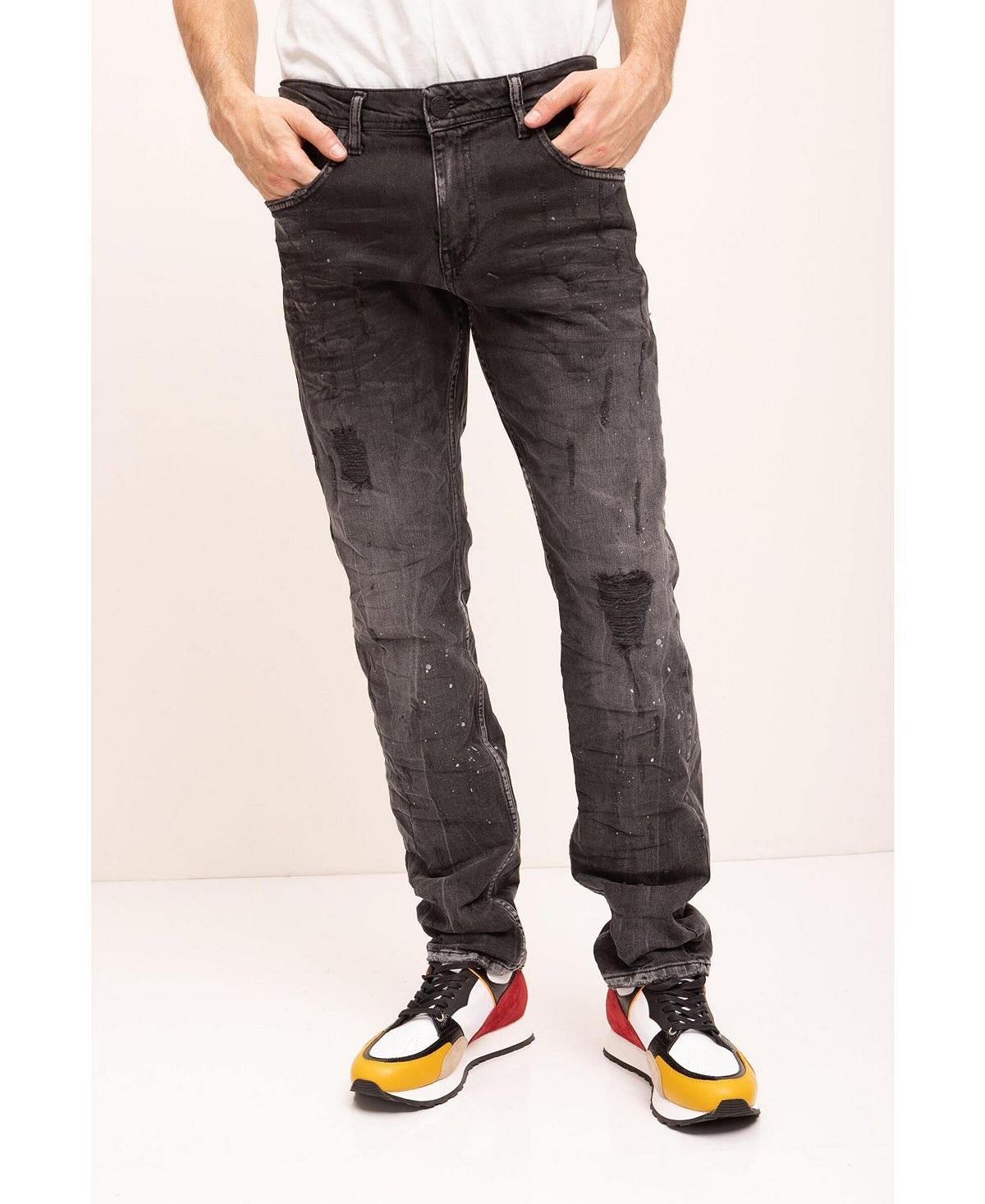 цена Мужские современные потертые джинсы из денима RON TOMSON