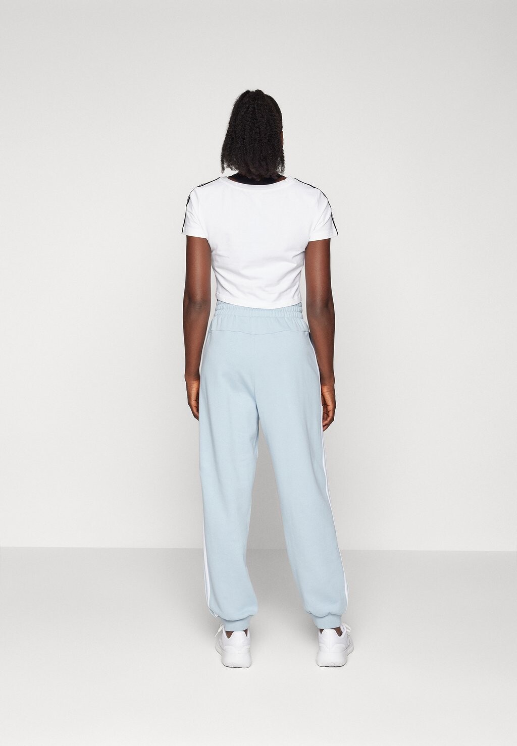 

Спортивные штаны Essentials Stripes Loose Pant adidas Sportswear, синие