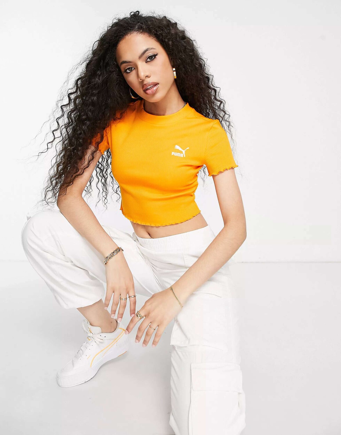 

Оранжевый укороченный топ с ярким салатовым краем Puma