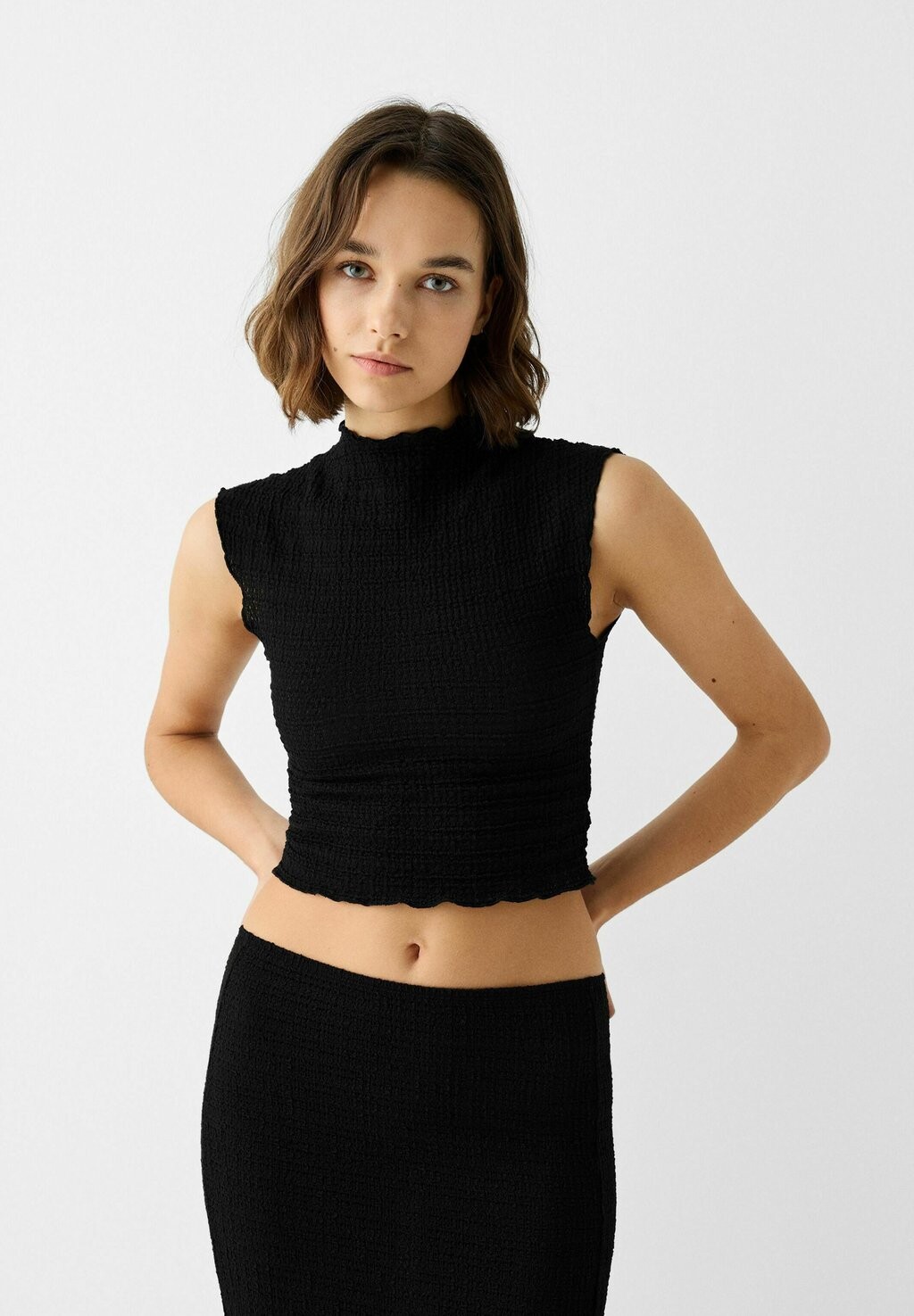 Топ SLEEVELESS WAFFLE Bershka, цвет black