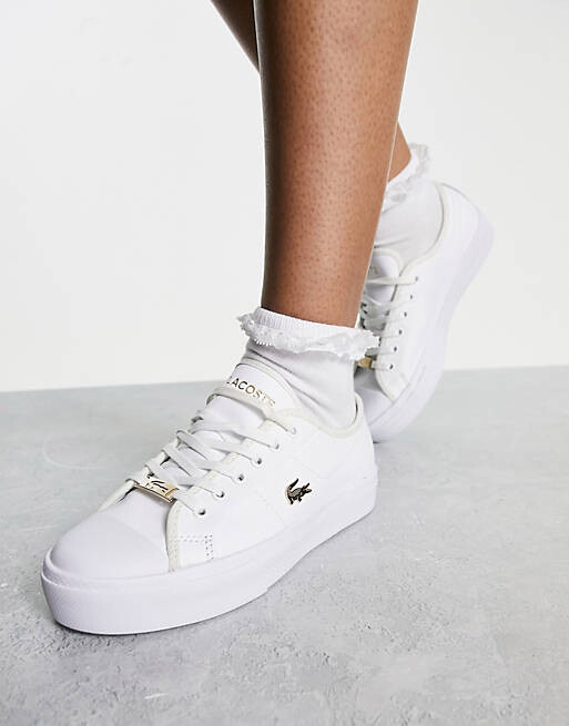 

Белые кроссовки на платформе Lacoste Ziane