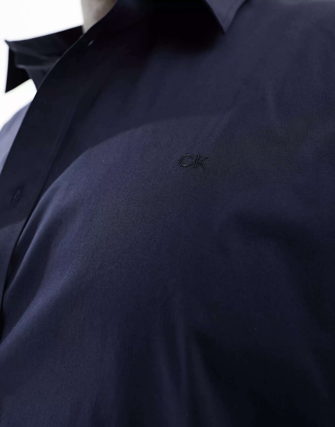 

Темно-синяя узкая рубашка из эластичного поплина Calvin Klein Big & Tall