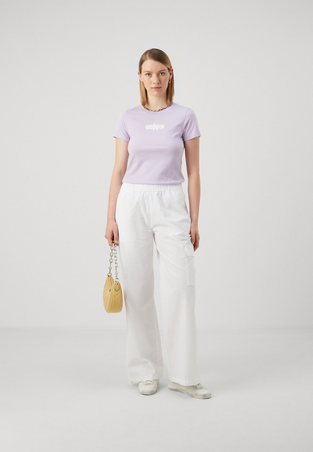 

Футболка с принтом Outlined Slim Tee Calvin Klein, пастельно-сиреневый