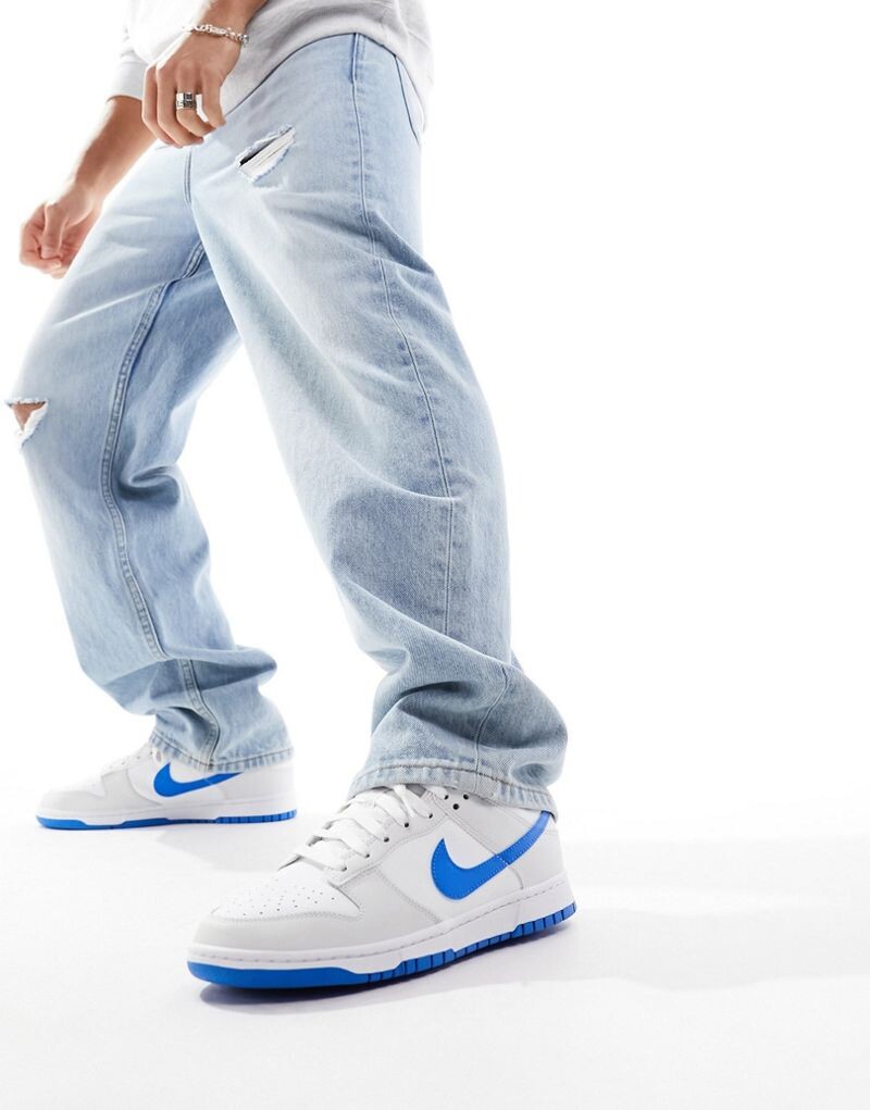 

Бело-синие кроссовки Nike Dunk Low Retro