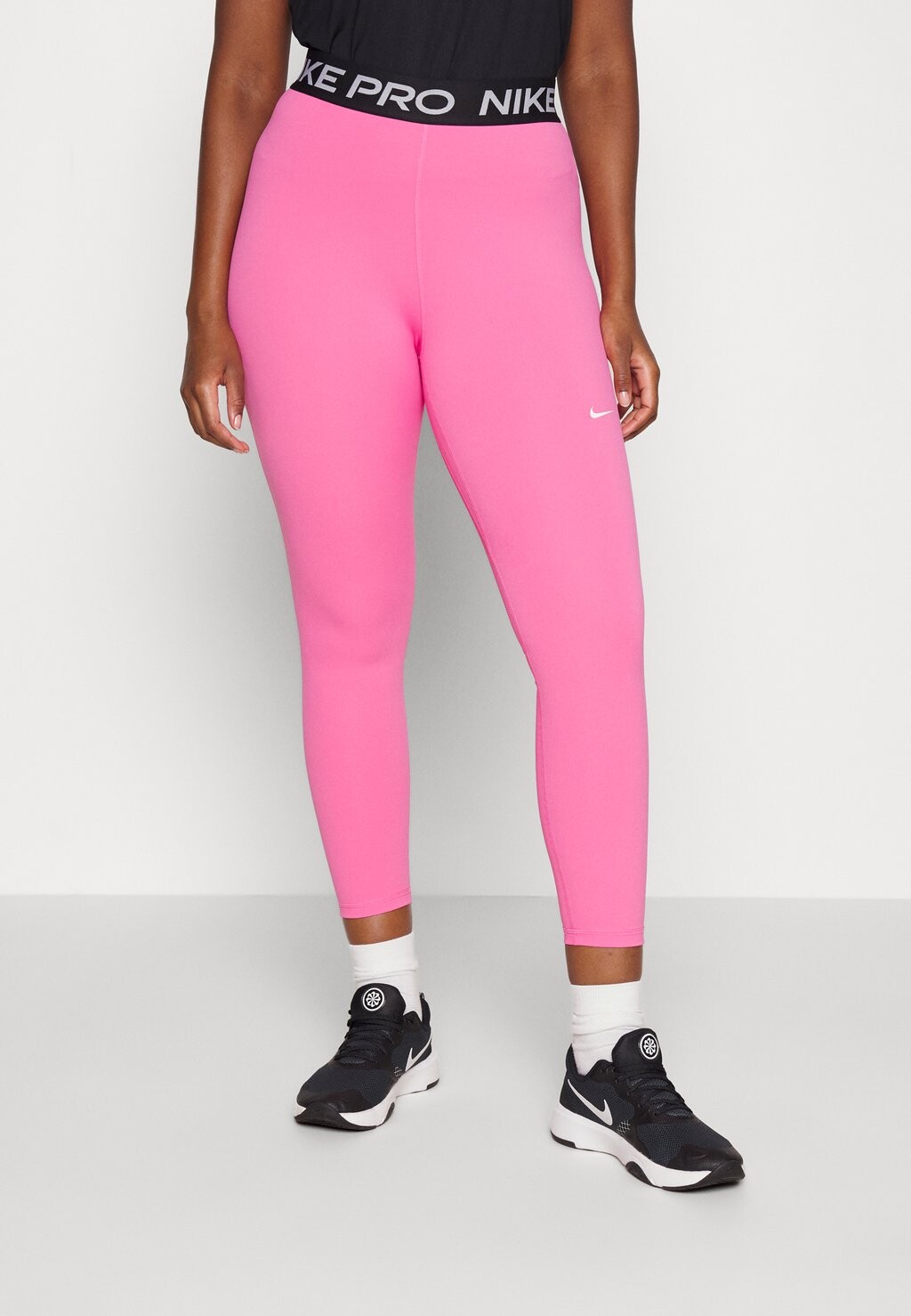 

Тайтсы Nike, Розовый