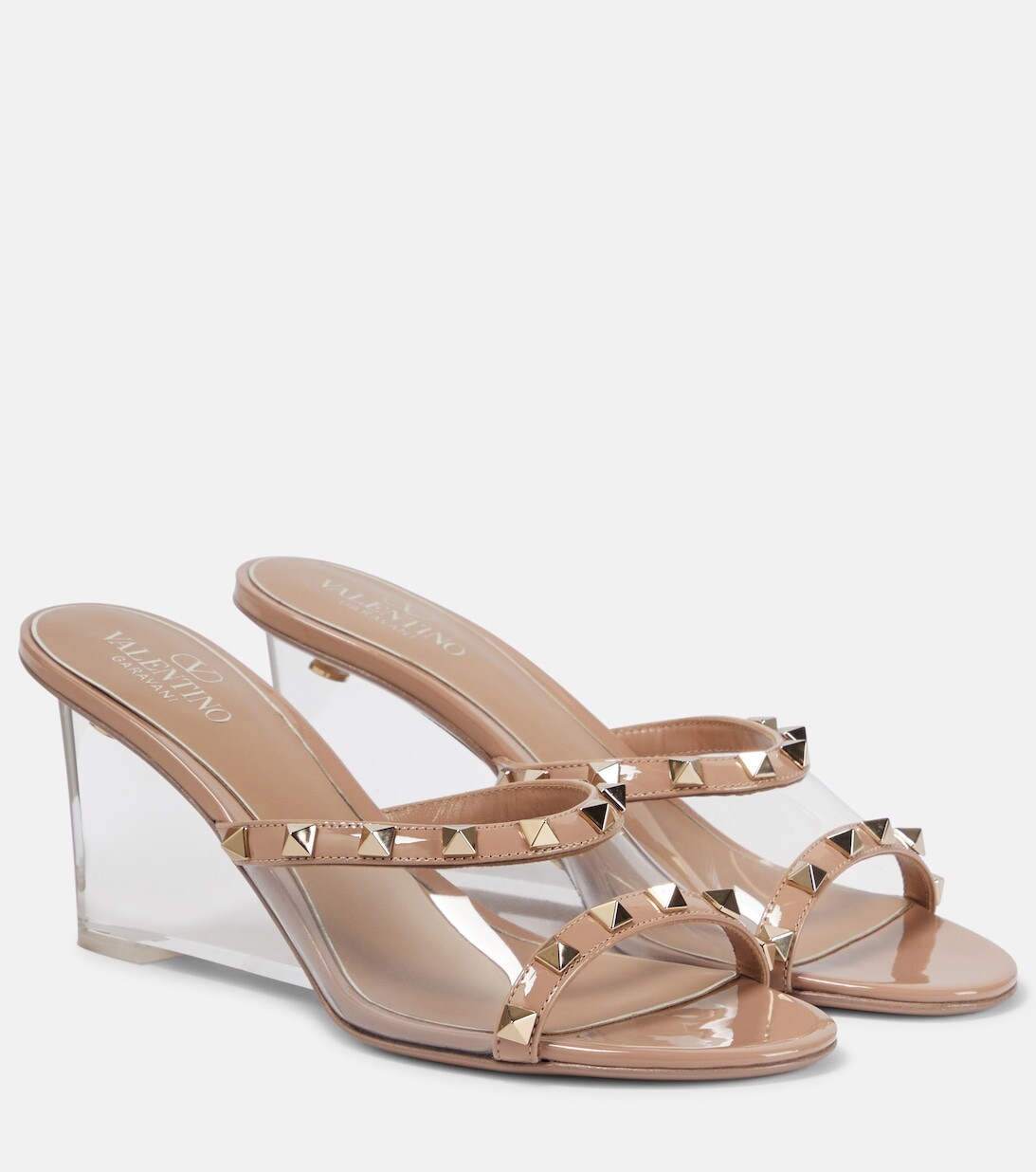 

Мюли Rockstud на танкетке из кожи и ПВХ Valentino Garavani, бежевый