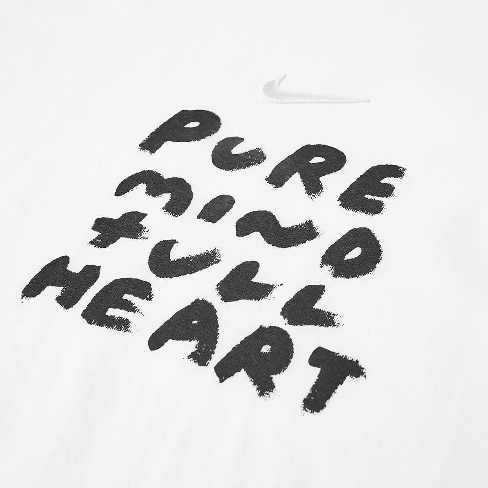 

Футболка с надписью Comme des Garçons Black x Nike, белый