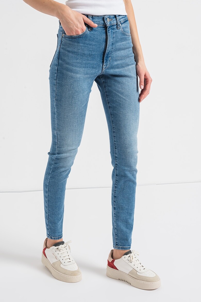 

Джинсы скинни Sylvia с высокой талией Tommy Jeans, синий