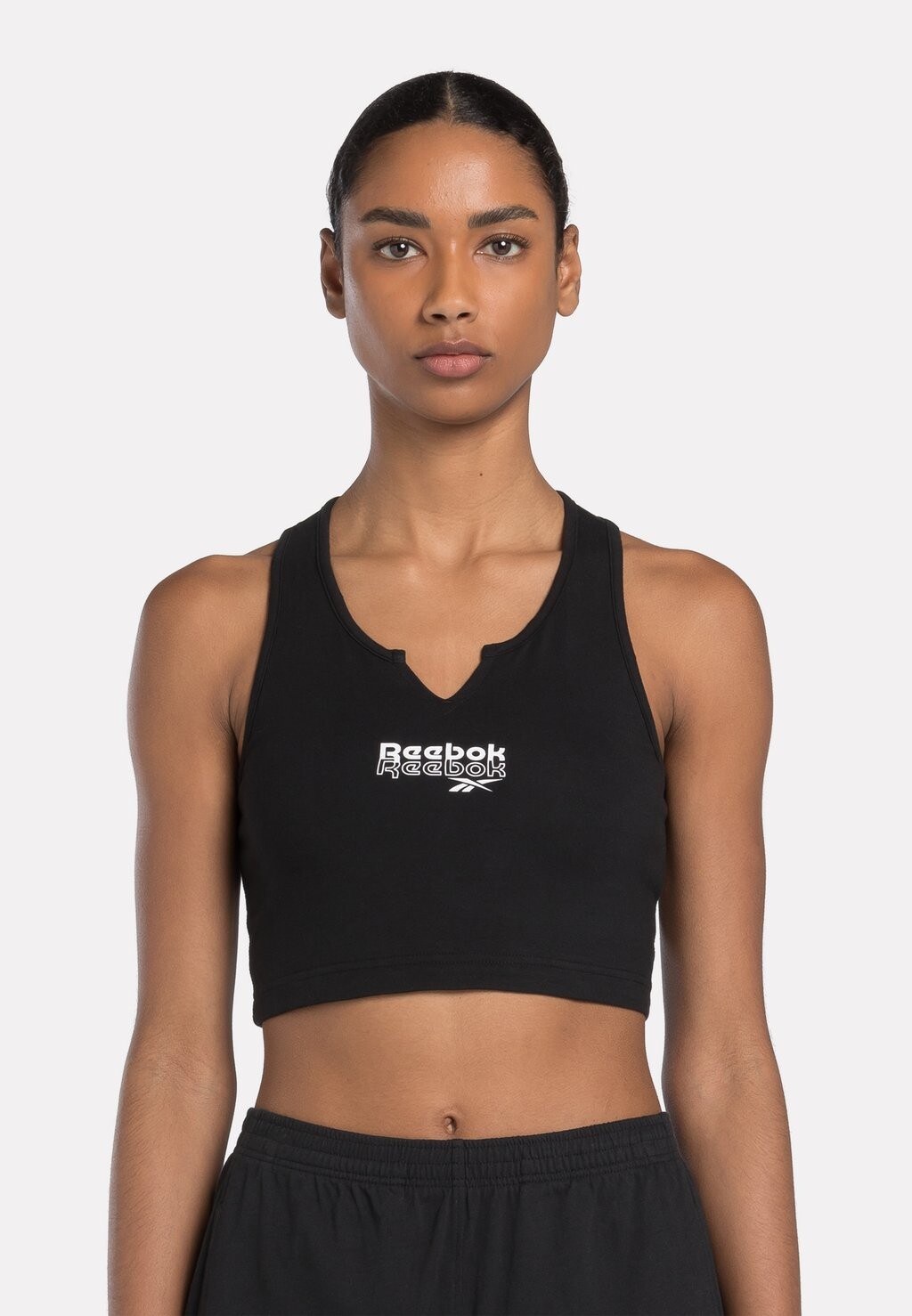 

Спортивный бюстгальтер с легкой поддержкой IDENTITY Reebok, черный