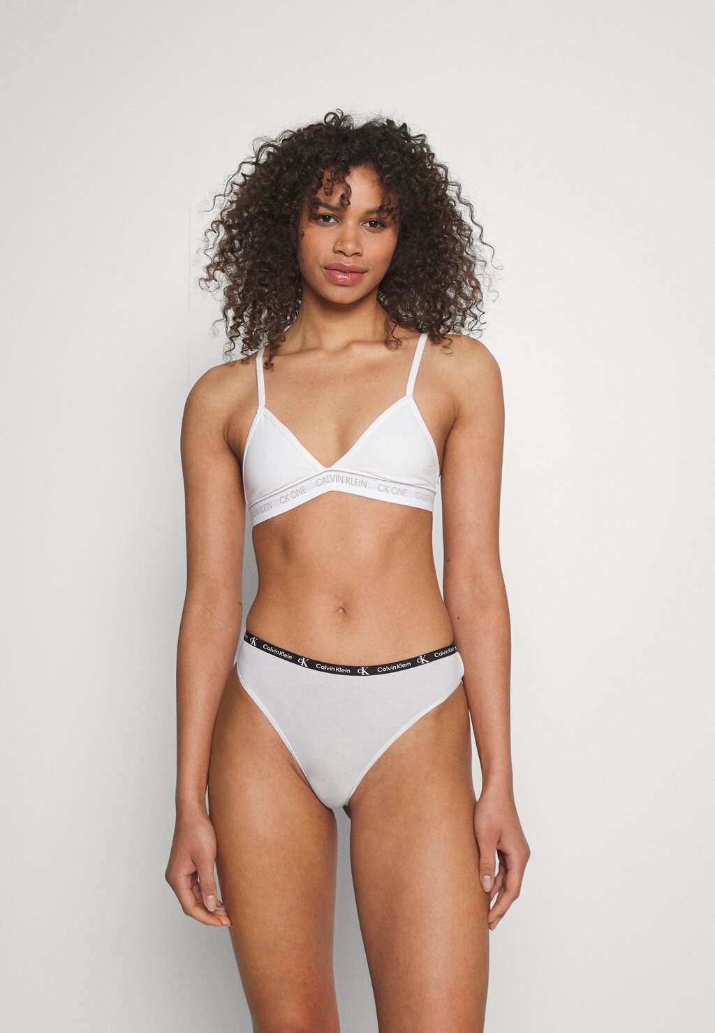 

Стринги MODERN THONG 7 PACK Calvin Klein Underwear, черный/пестрый серый/разноцветный