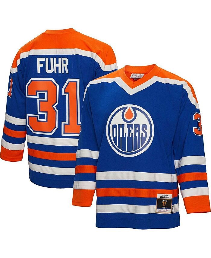 

Мужская футболка Grant Fuhr Royal Edmonton Oilers 1986 Blue Line Player Mitchell & Ness, синий
