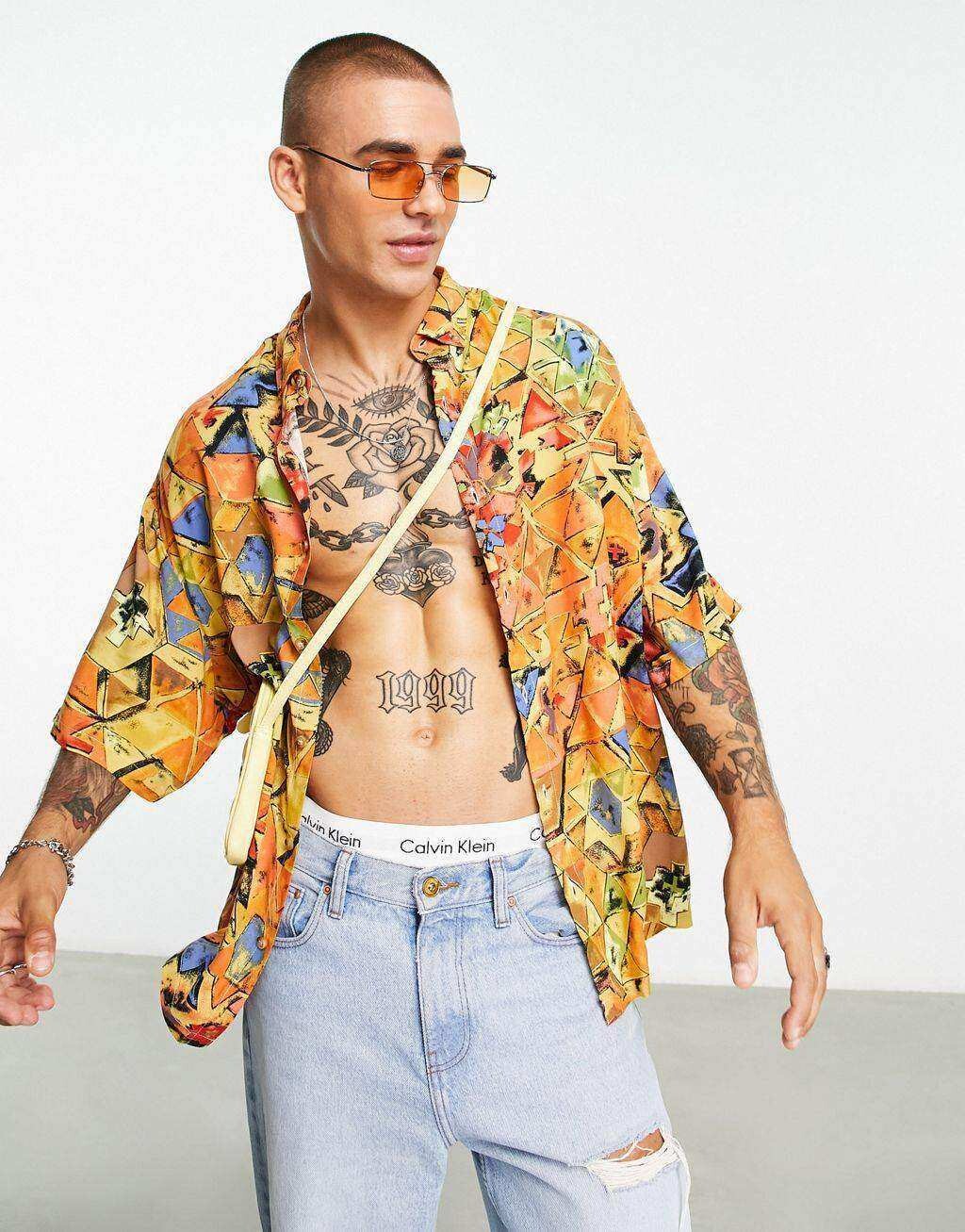 

Оранжевая свободная рубашка свободного кроя с винтажным принтом ASOS DESIGN