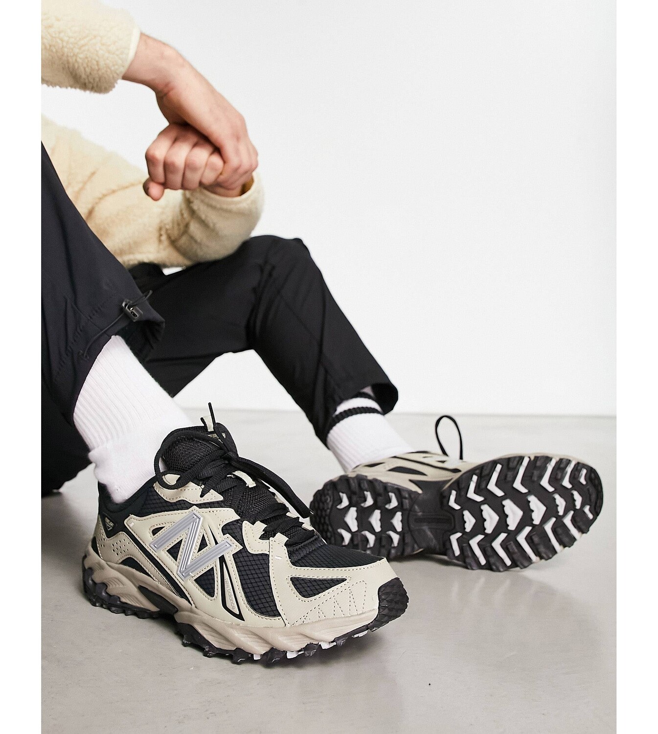 

Черно-коричневые кроссовки New Balance 610