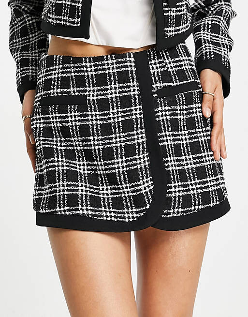 

Черная юбка-букле в клетку River Island Petite