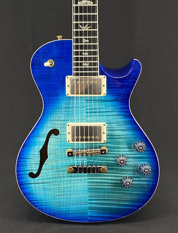 

Электрогитара PRS Wood Library McCarty Singlecut 594 Semi-Hollow in Makena Blue Burst