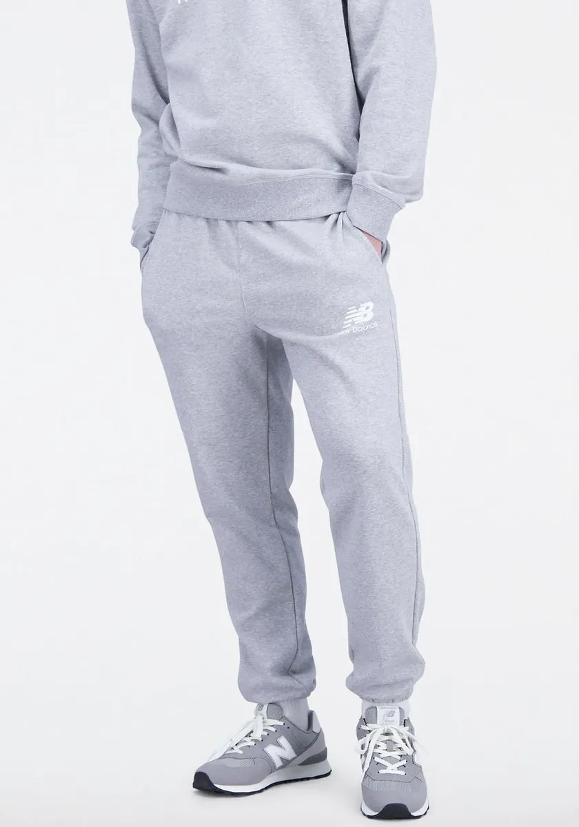 

Спортивные брюки New Balance "NB ESSENTIALS STACKED LOGO SWEATPANT", серый