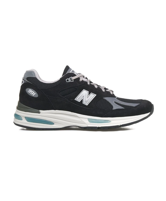 

Замшевые кроссовки в стиле ретро со светоотражателями New Balance, черный