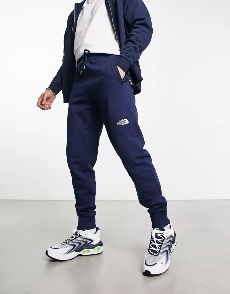 

Темно-синие легкие джоггеры The North Face NSE