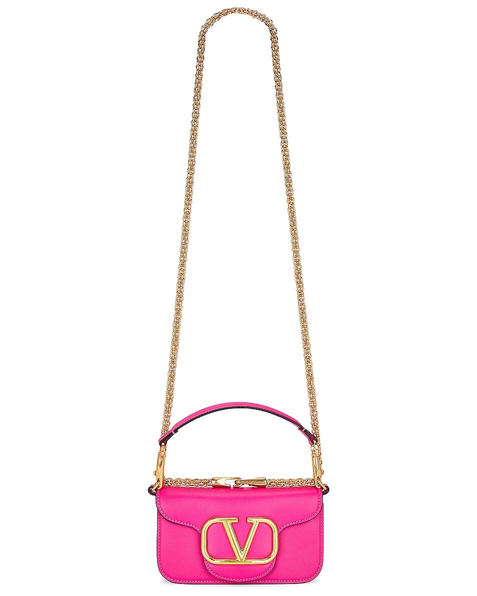 

Сумка кросс-боди Valentino Garavani Loco Small Shoulder, розовый
