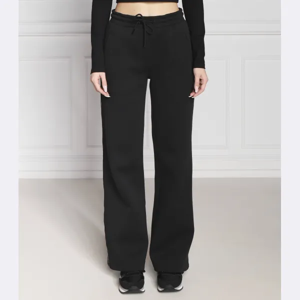 

Спортивные брюки с расклешенной окантовкой и логотипом Calvin Klein, черный