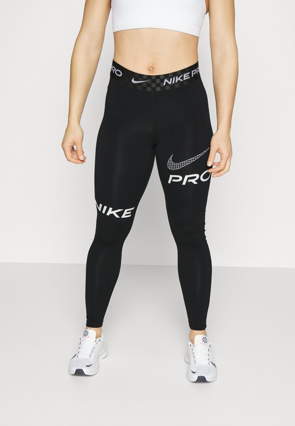 

Тайтсы Nike