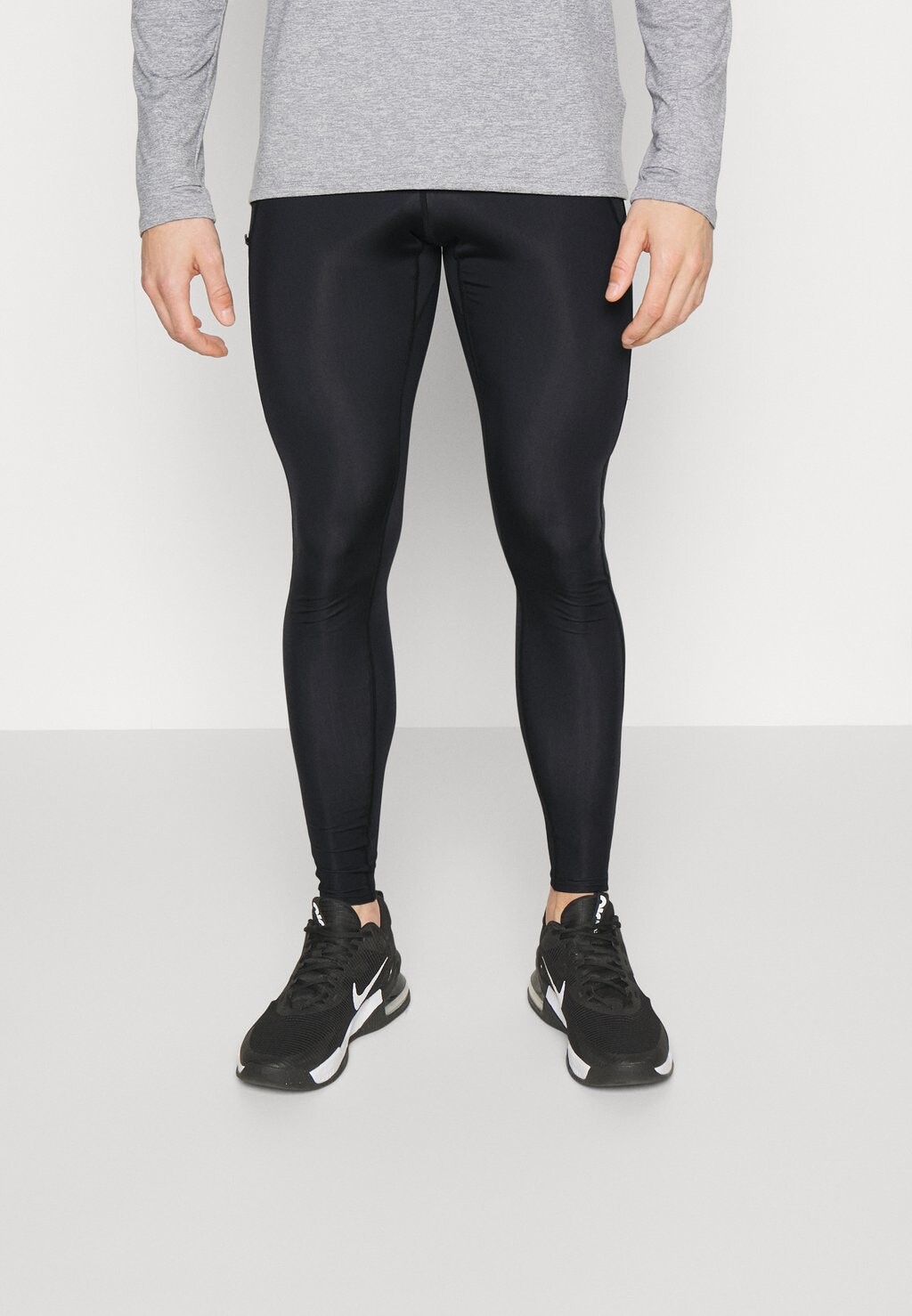 

Тайтсы Mizuno