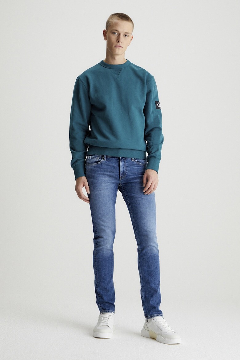 

Джинсы скинни с потертым эффектом Calvin Klein Jeans, синий