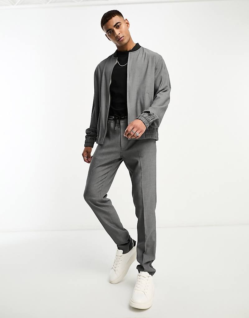 

Черные элегантные узкие брюки с фактурой в горошек ASOS DESIGN — часть комплекта