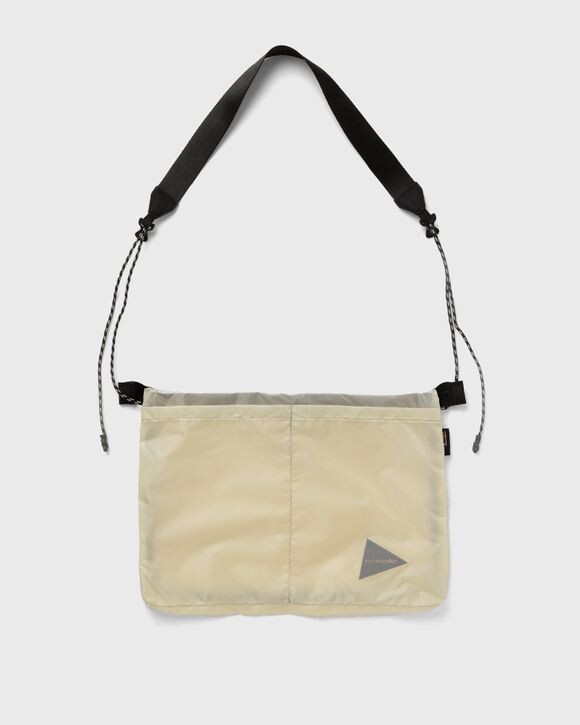 

Сумка And Wander Sil Sacoche, цвет off white 031