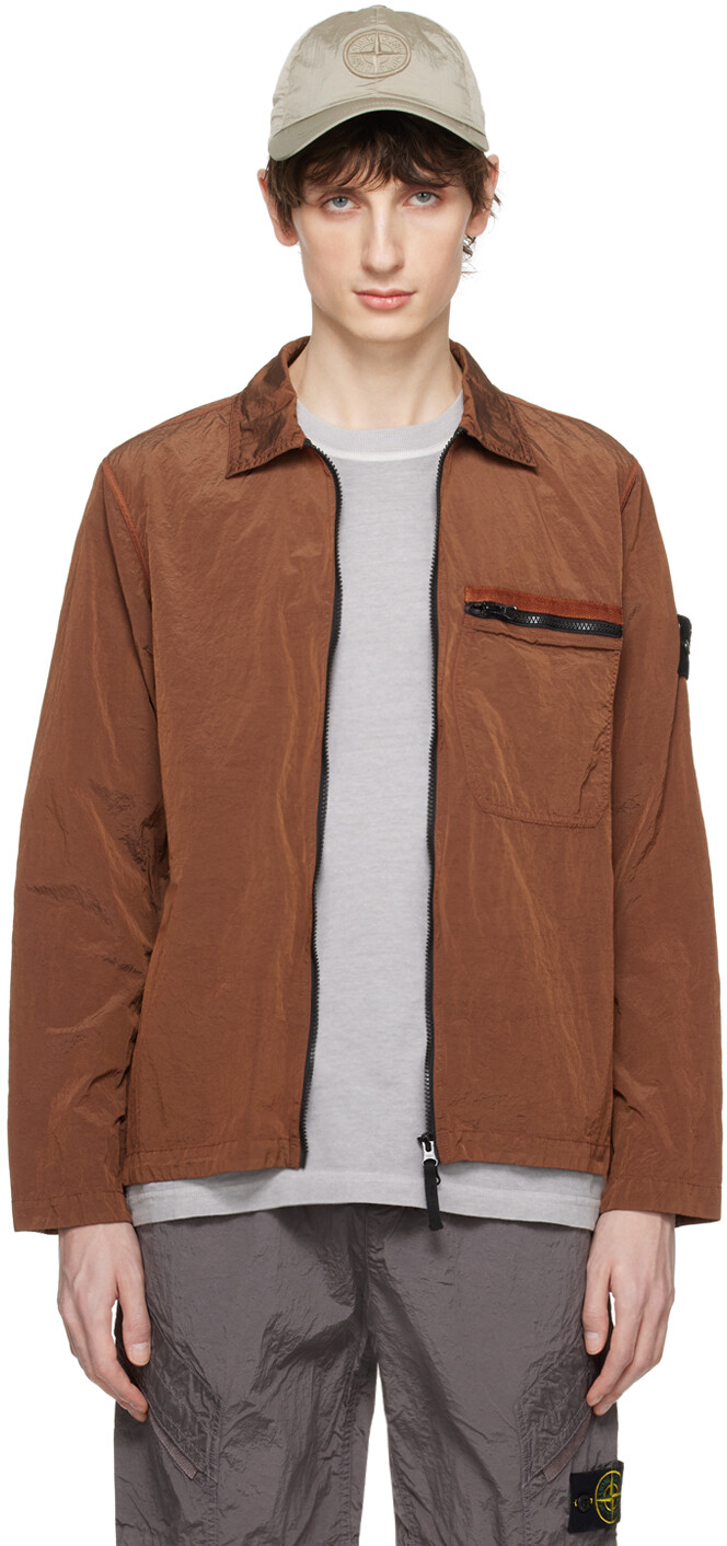 

Оранжевая куртка с нашивками Stone Island