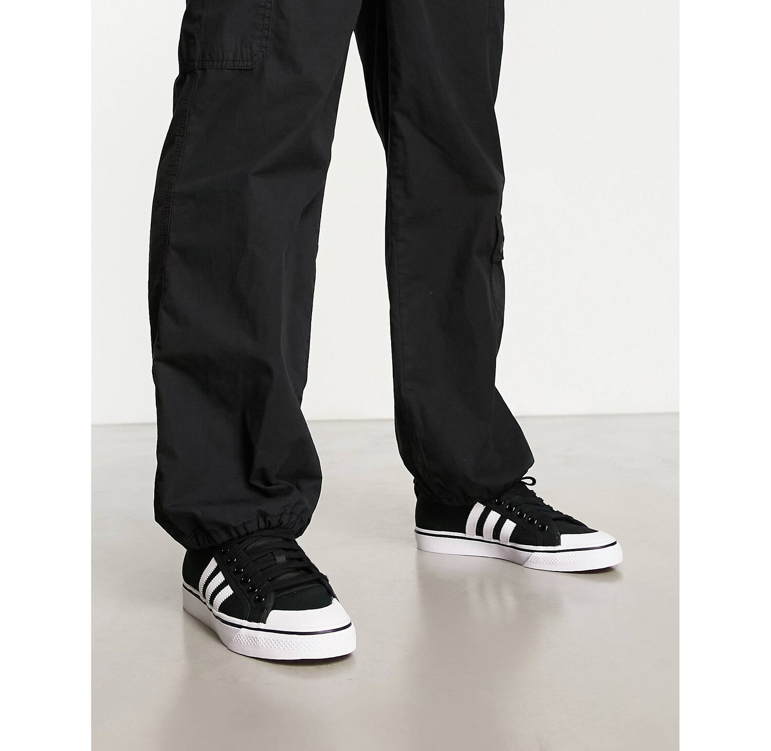 

Черные кроссовки adidas Originals Nizza