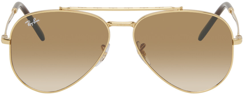 

Золотые солнцезащитные очки-авиаторы New Ray-Ban