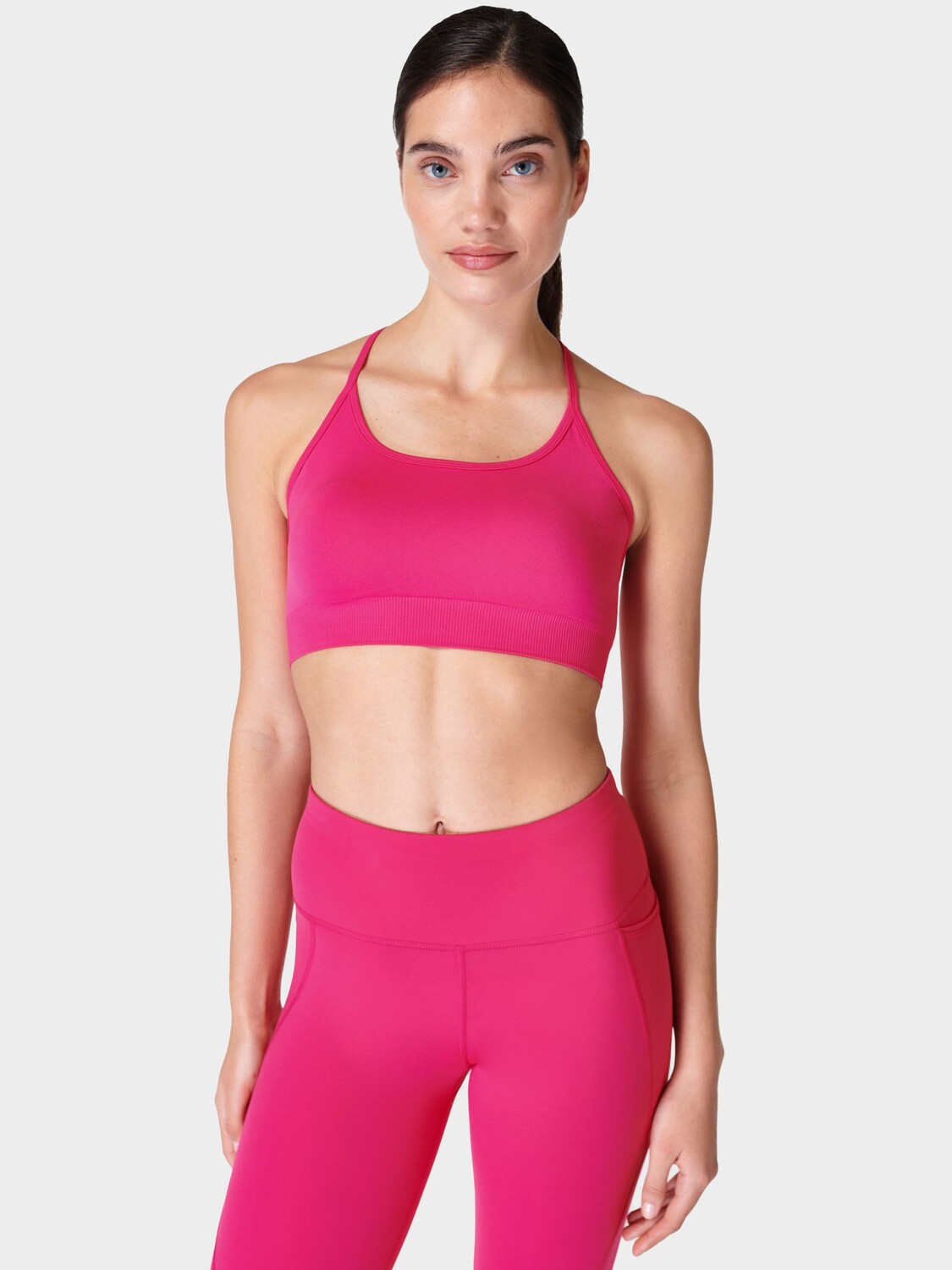 

Бюстгальтер для йоги Sweaty Betty Spirit Reformed, розовый Framboise