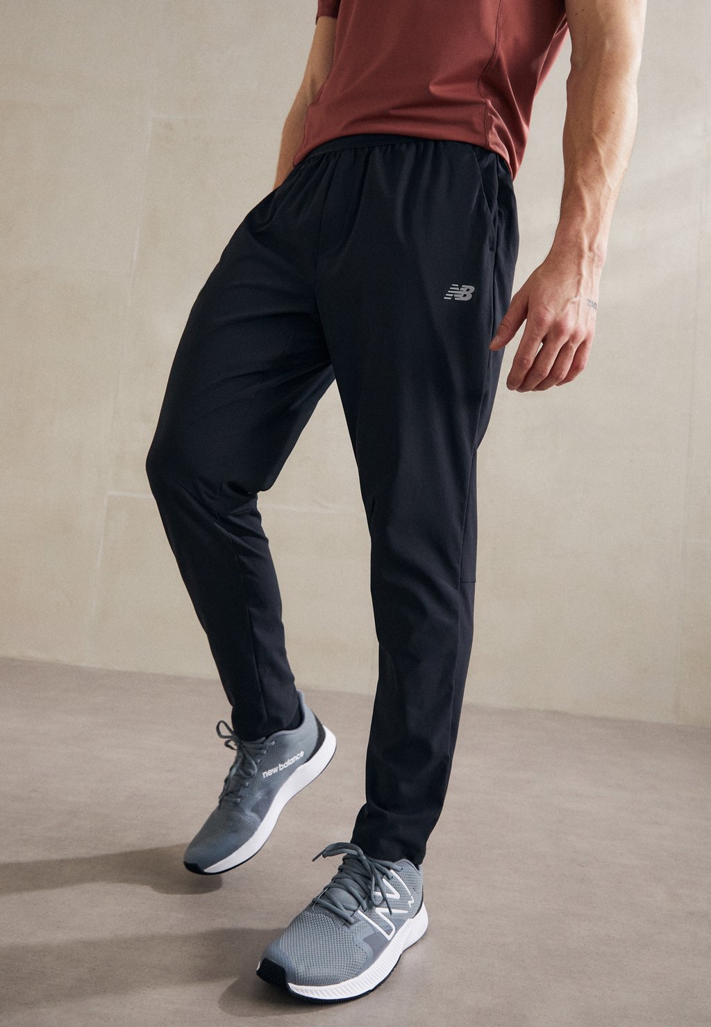 Спортивные штаны AC STRETCH REGULAR , цвет black New Balance