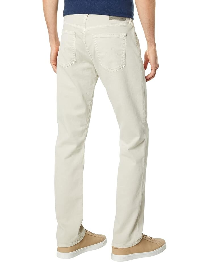 

Джинсы AG Graduate Tailored Leg Jeans in 7 Year Sulfur Fade To Graye, цвет 7 Year Sulfur Fade To Graye