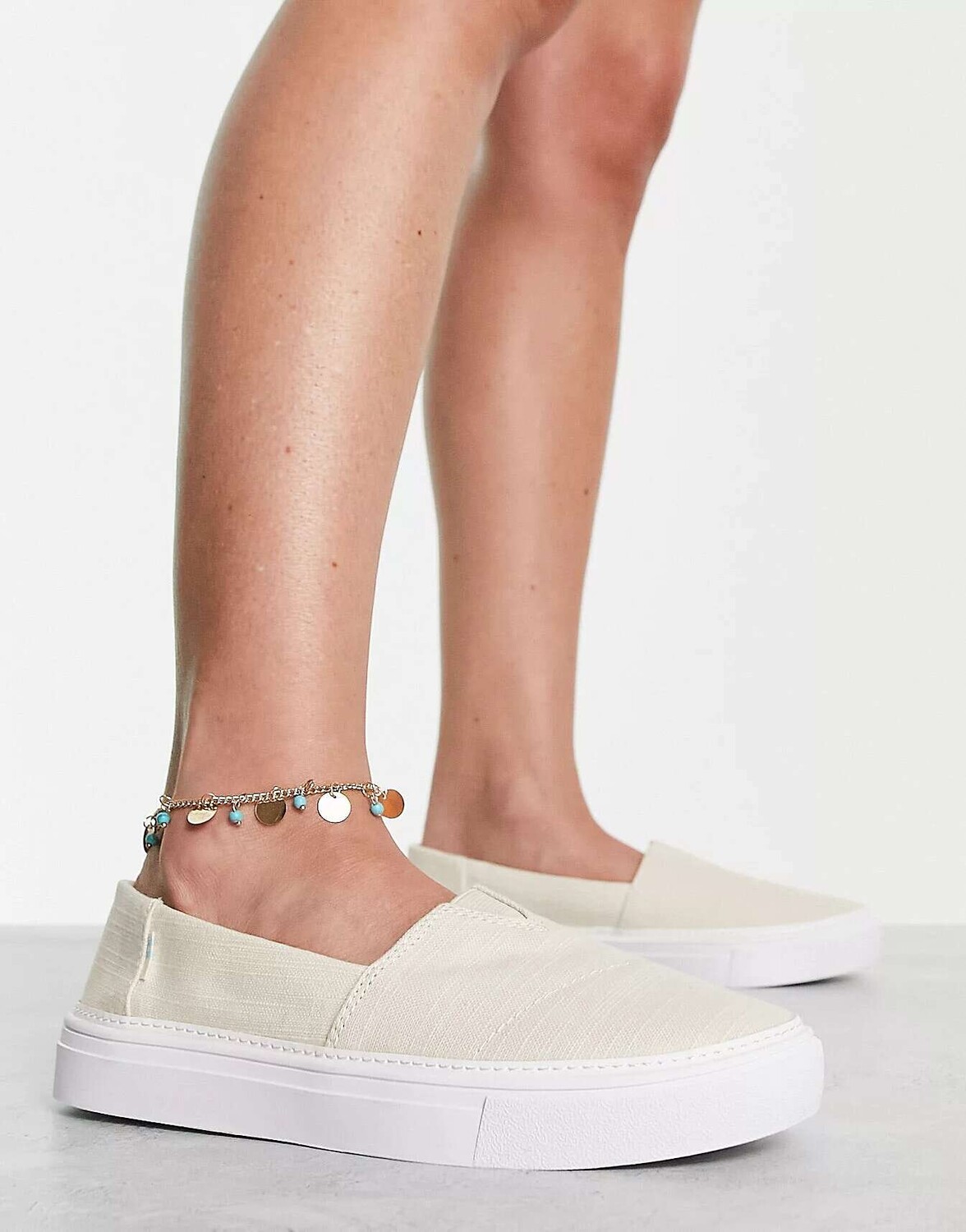 

Натуральные кроссовки-слипоны Toms parker