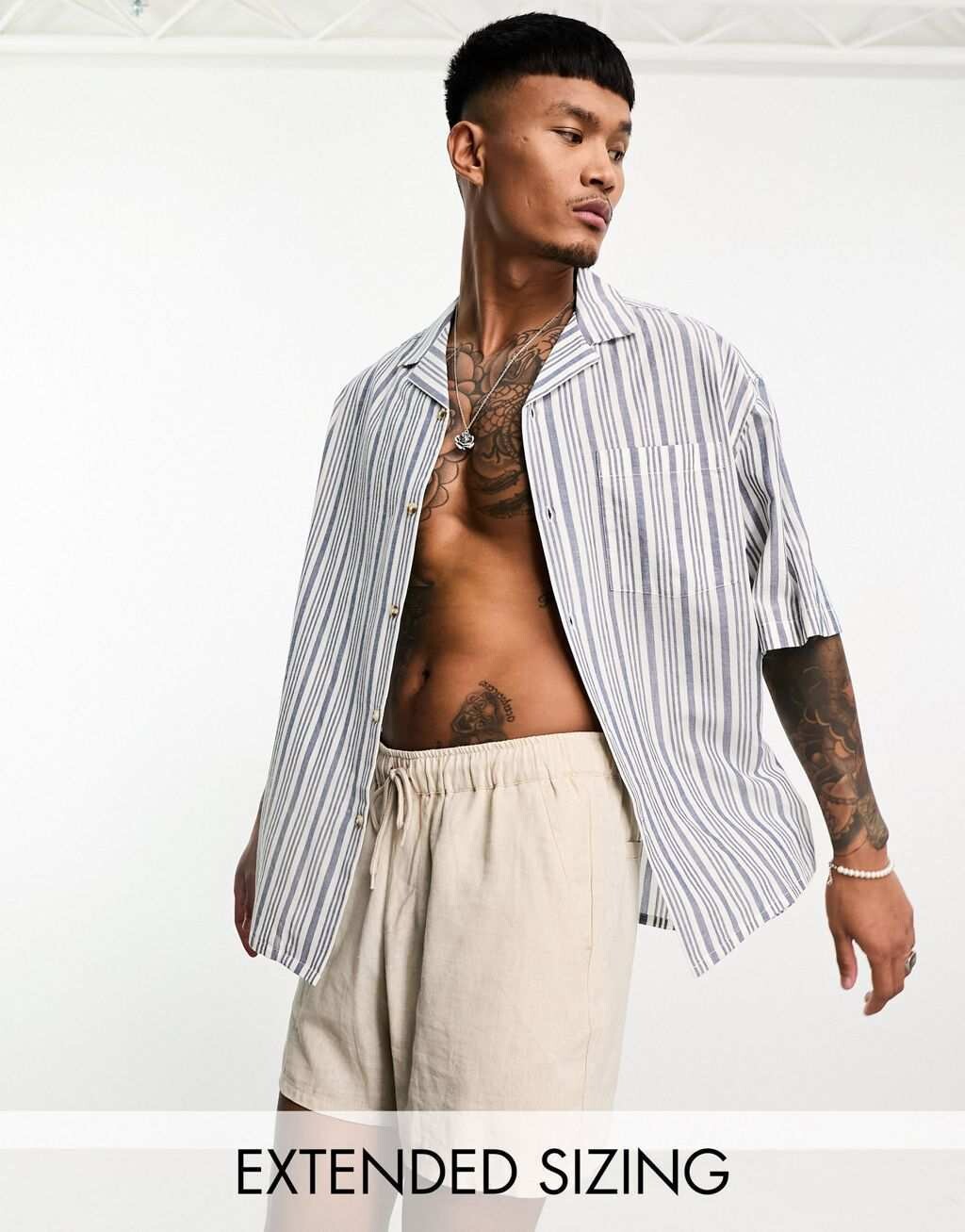 

Свободная рубашка свободного кроя в синюю полоску ASOS DESIGN