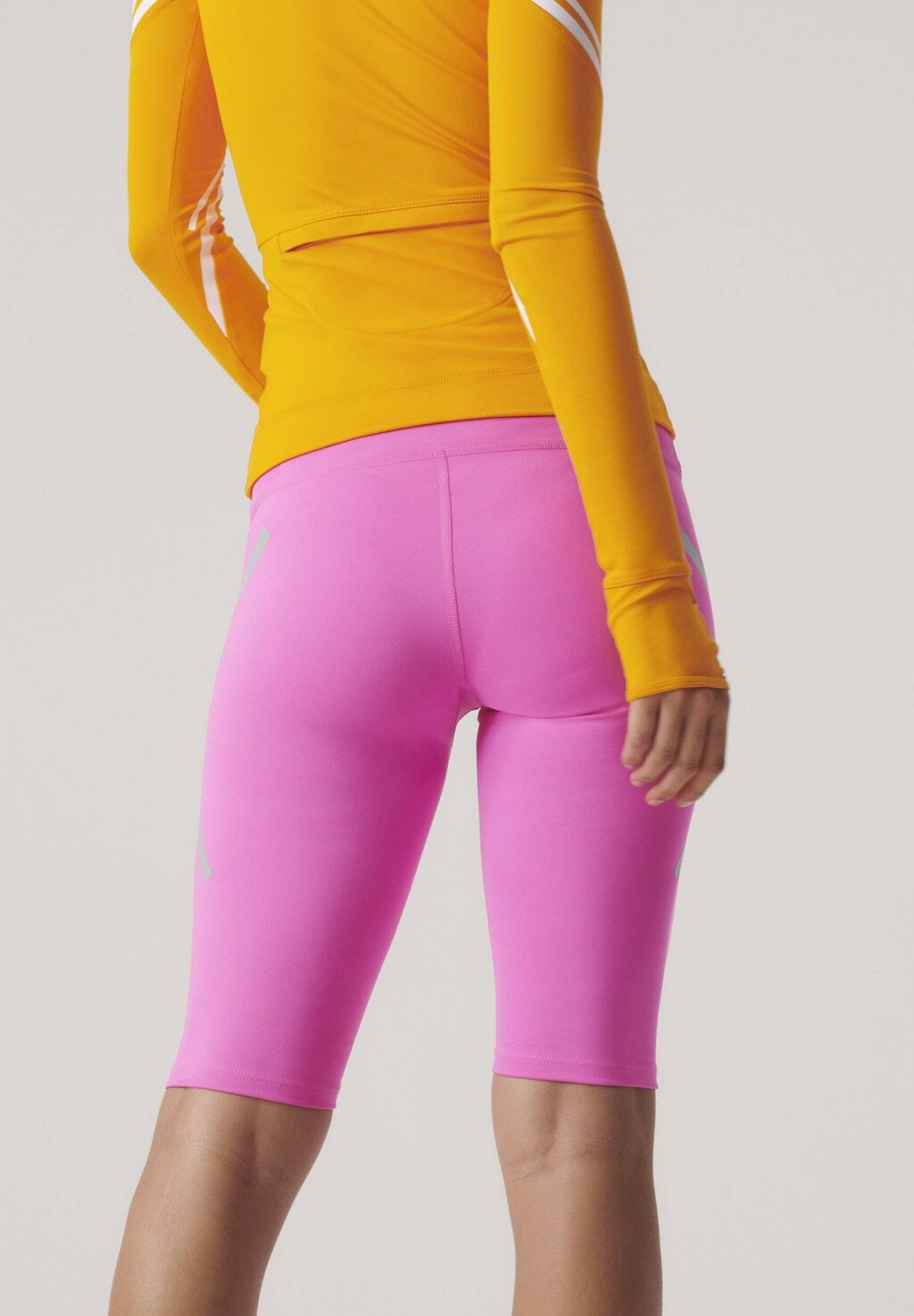 

Тайтсы adidas by Stella McCartney, Розовый
