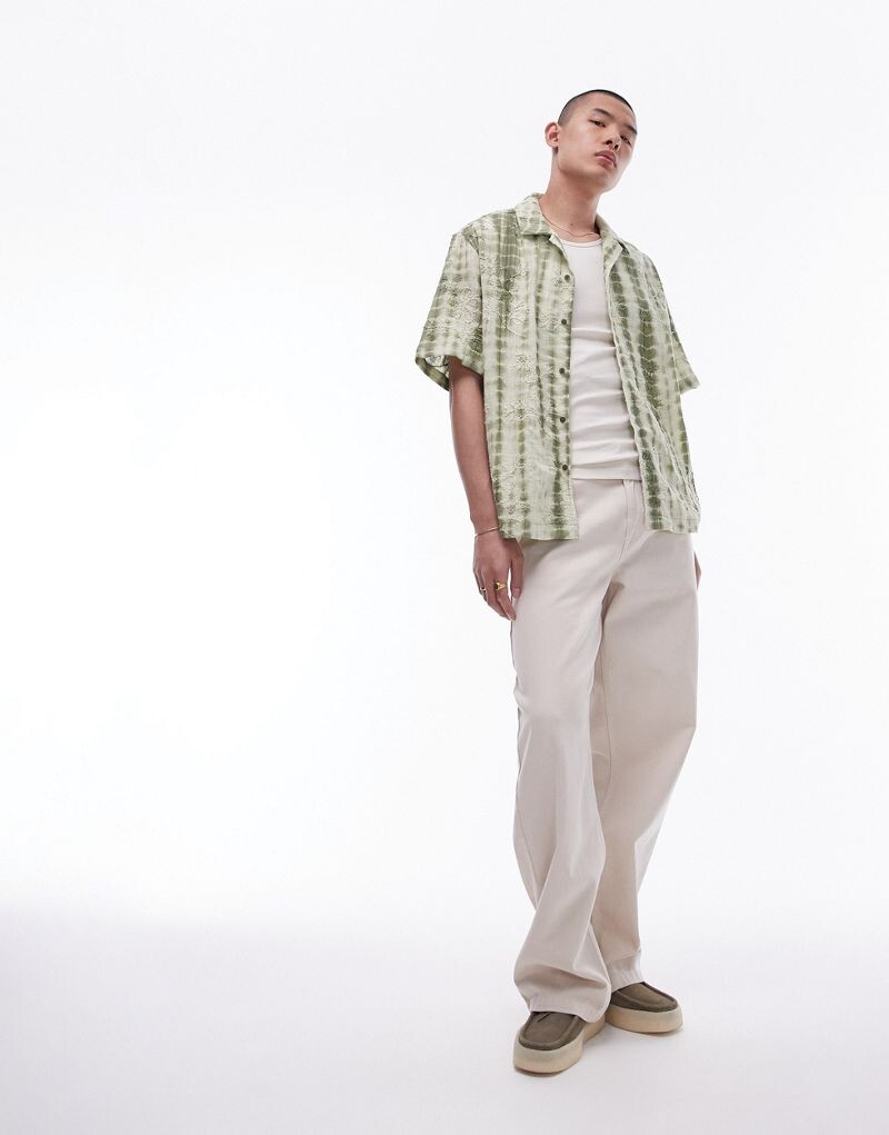 

Topman — очень широкие брюки цвета экрю из хлопкового твила