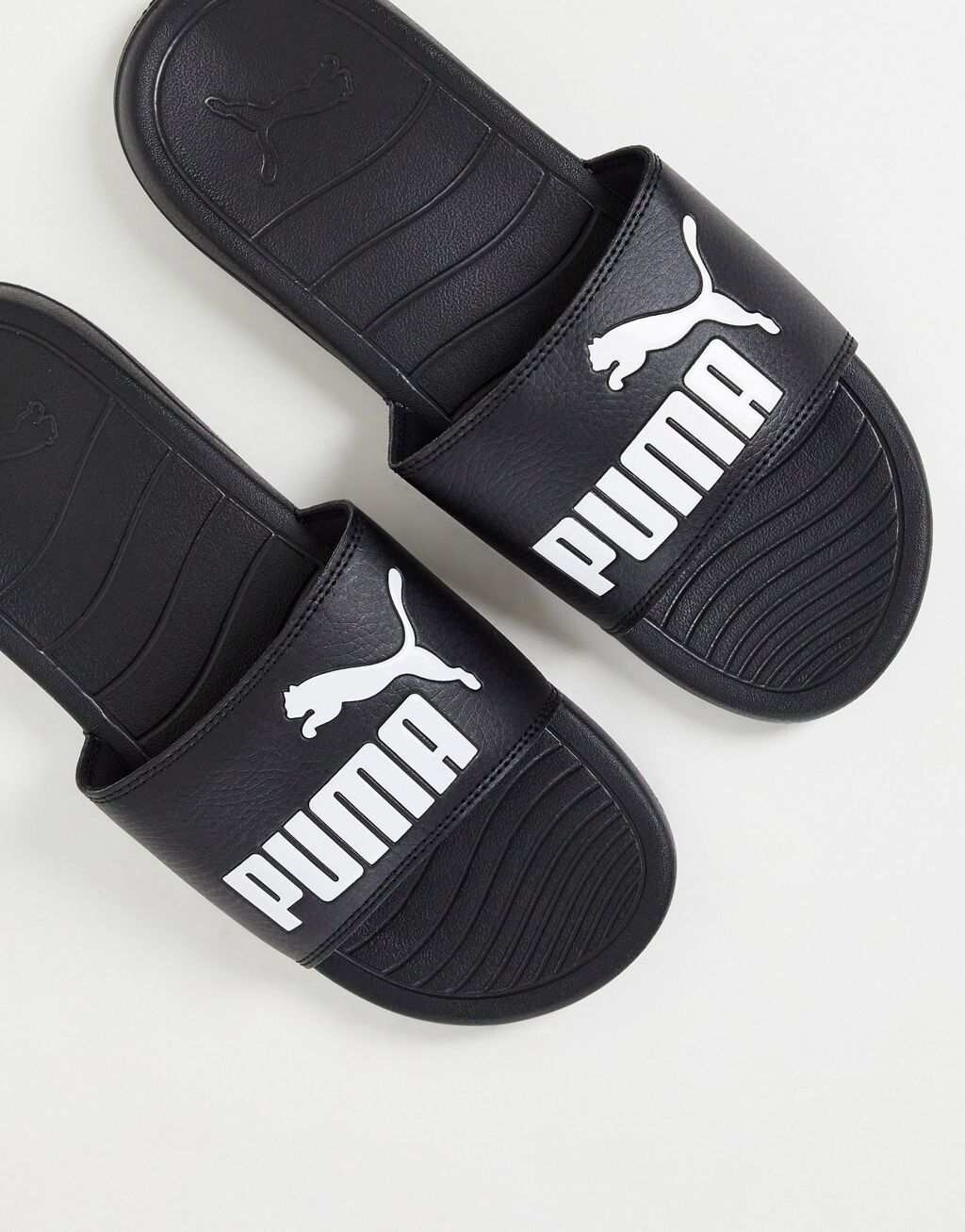 

Черные шлепанцы Puma Popcat