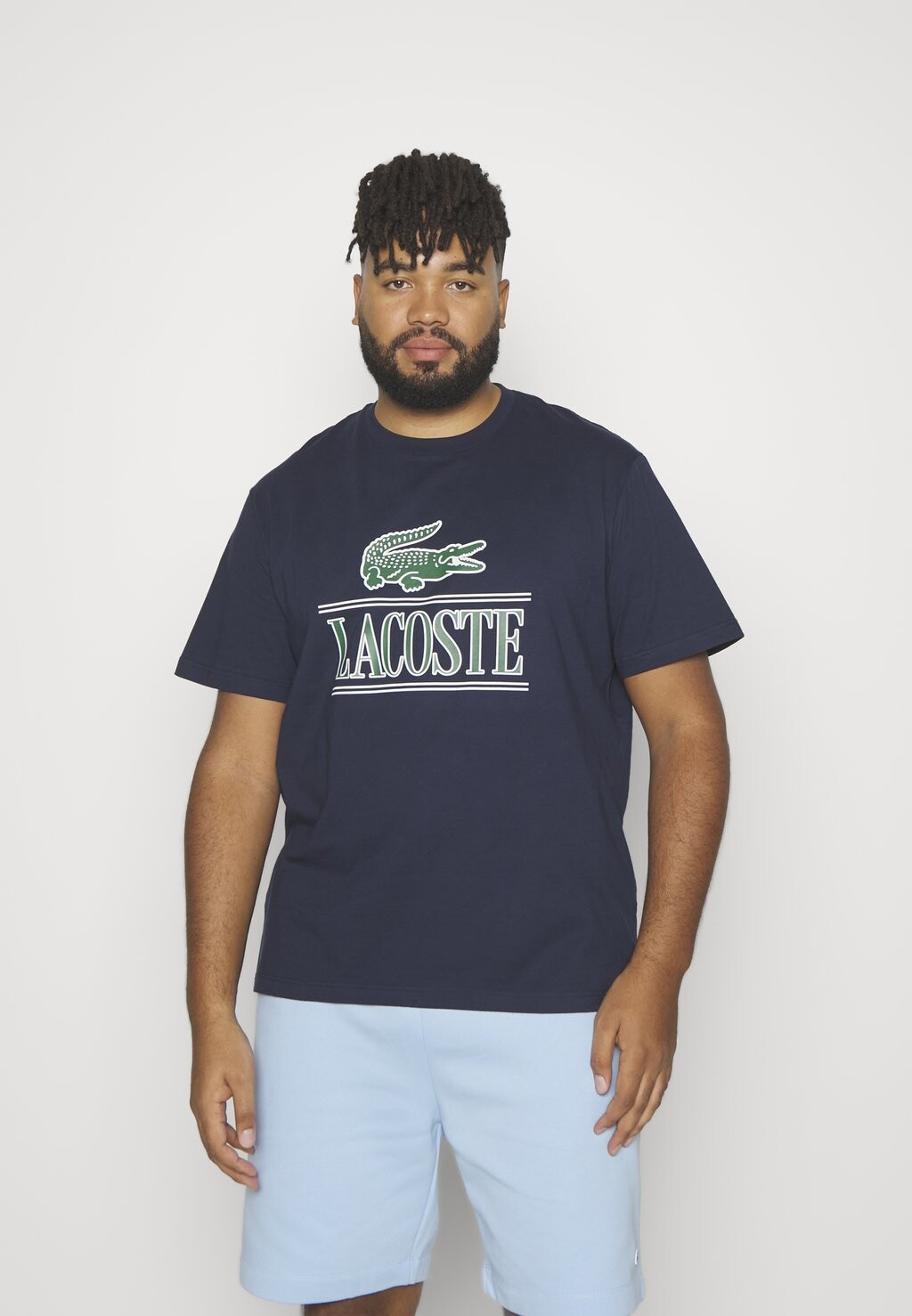 

Футболка с принтом Lacoste, темно-синий