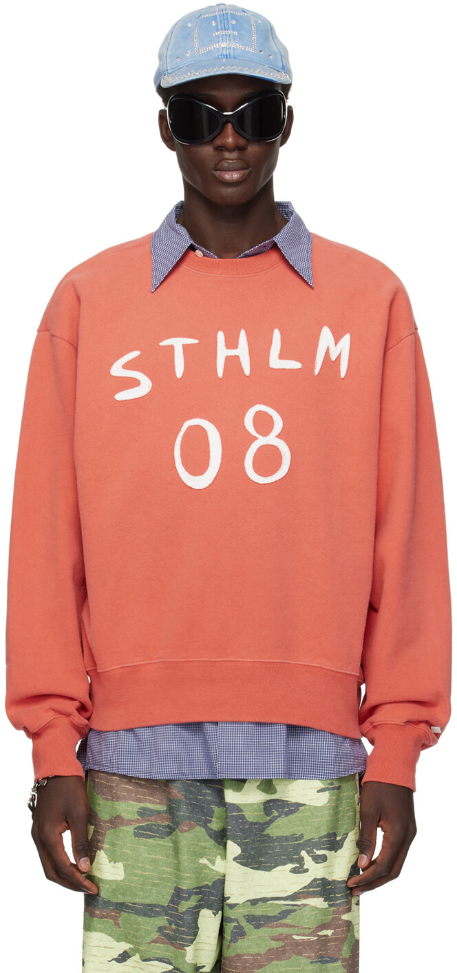 

Оранжевый свитер с принтом Acne Studios