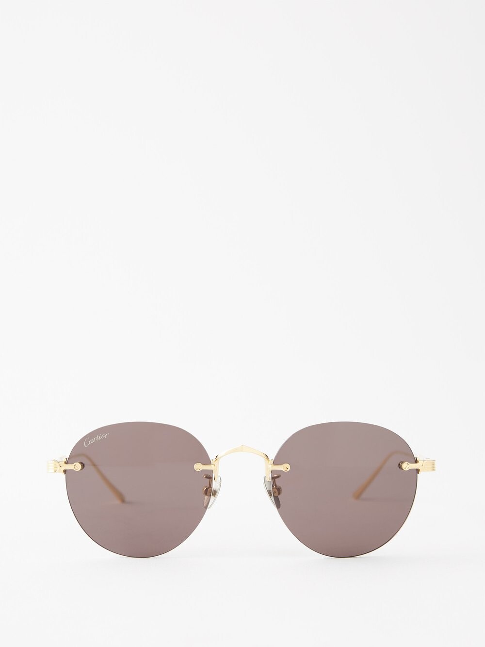 

Фирменные круглые солнцезащитные очки в металлическом корпусе Cartier Eyewear, золото
